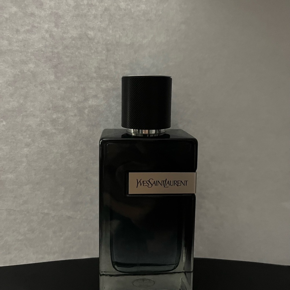 Yves Saint Laurent Elegant Black Glass Bottle